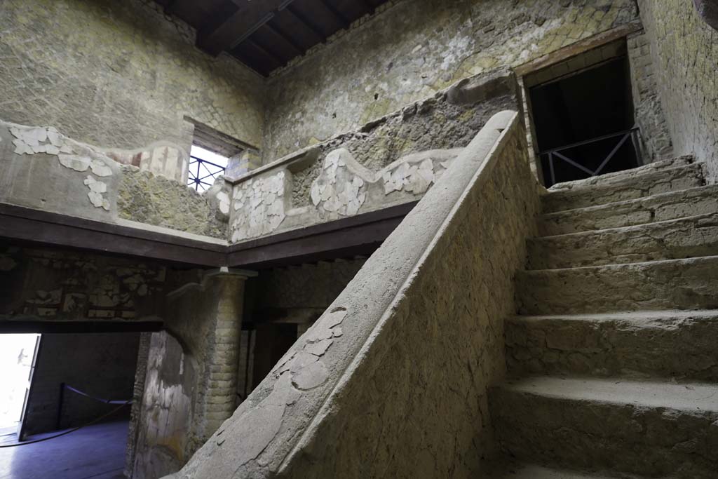 V.8 Herculaneum. August 2021. Area 4, with stairs to upper masonry landing on north side. Photo courtesy of Robert Hanson.